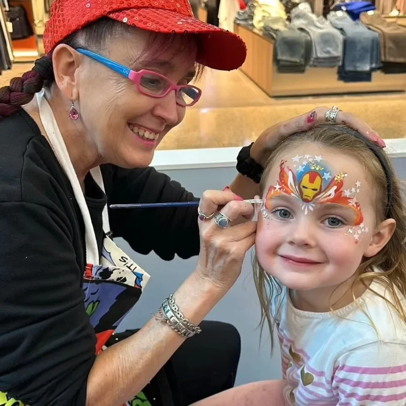 Pinky Painting a Little Girls face
